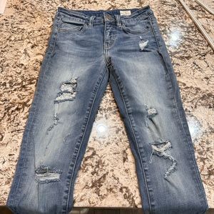 Bridge by gly. Mid rise ankle skinny distressed denim